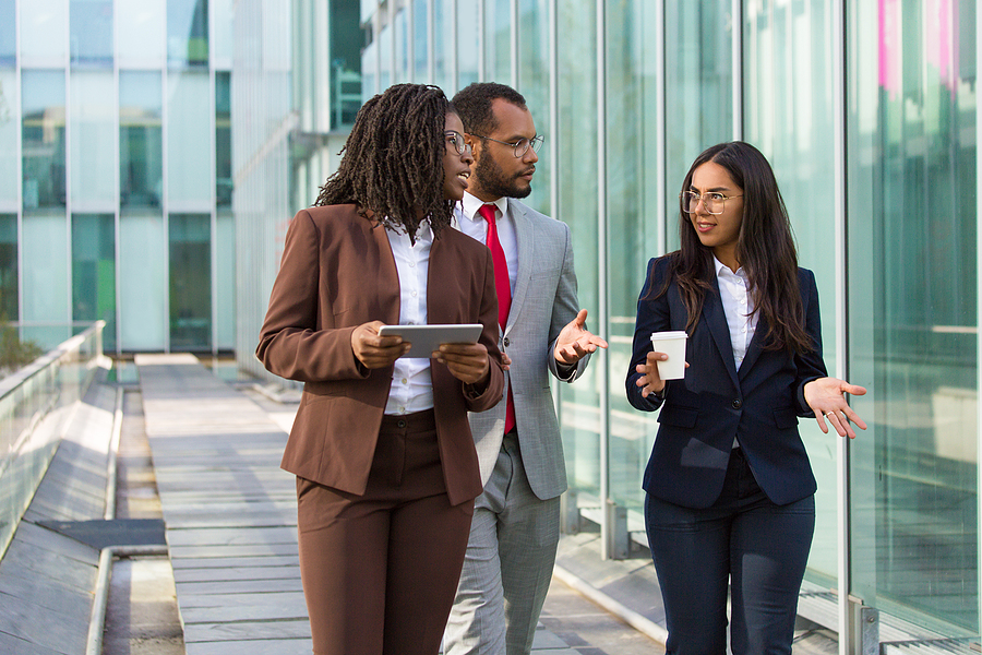 Team Of Diverse Colleagues On Their Way To Office. Business Man