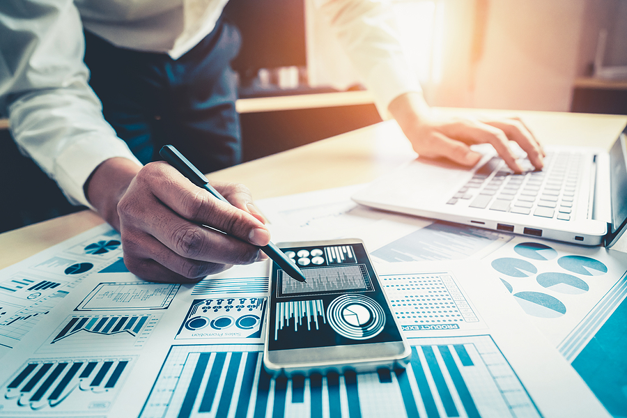 Businessman Analyze Data Of Stock Market Research.