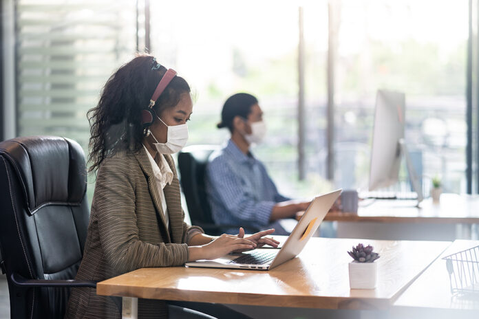 Mixed race of African black and asian businesswoman office worke