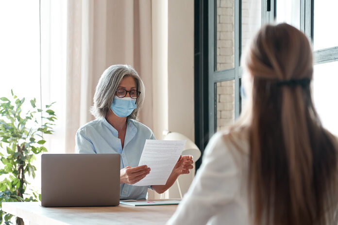 Old Hr Manager Checking Female Job Applicant Cv Resume At Job In