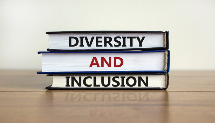 Diversity And Inclusion Symbol. Books With Words 'diversity And