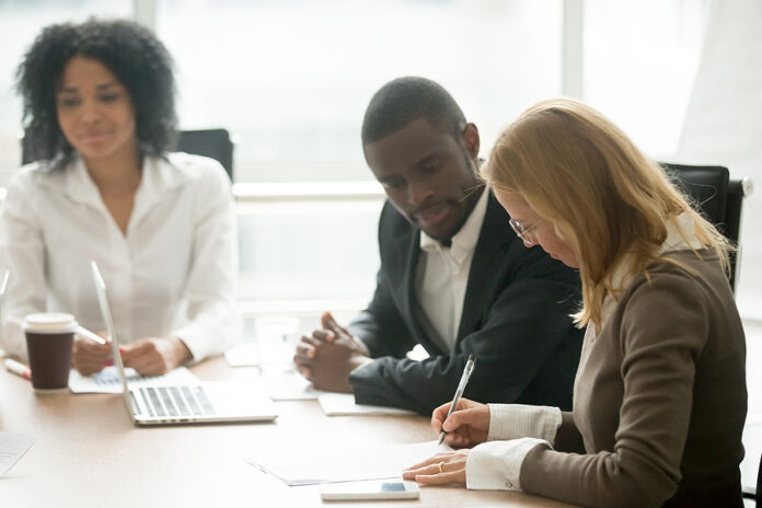 Caucasian Businesswoman Signing Business Document Making Deal At