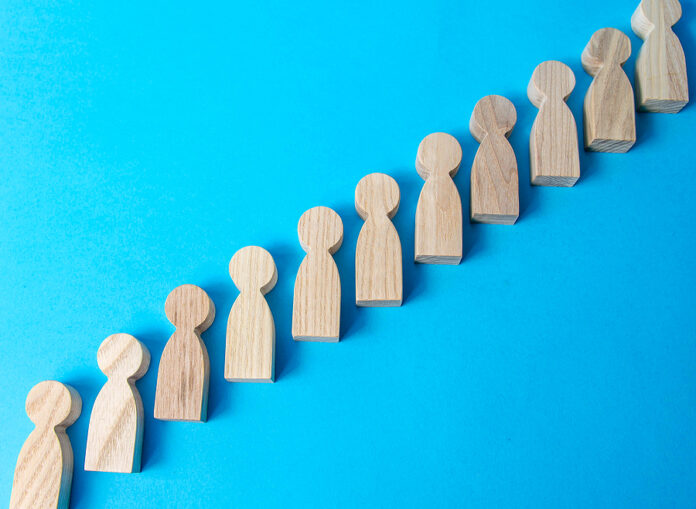 Figures Of People In A Row. Society, Demography. Selection Conce