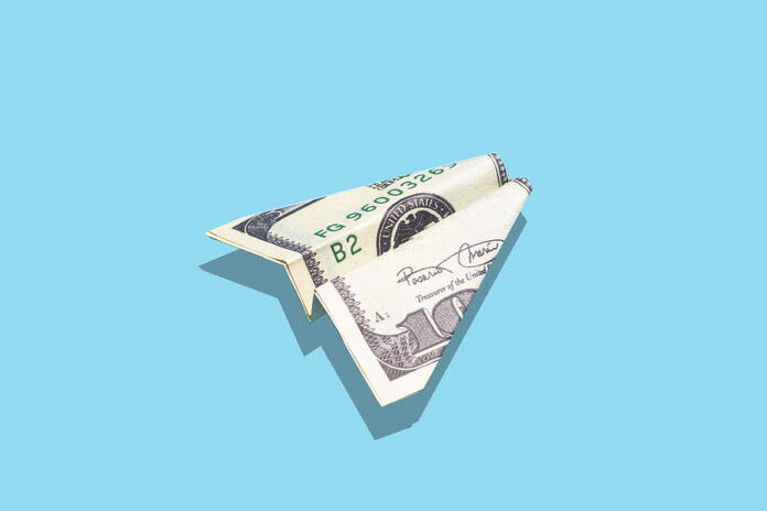 Travel Flight Money And Money Growth Concept. Us Dollar Airplane