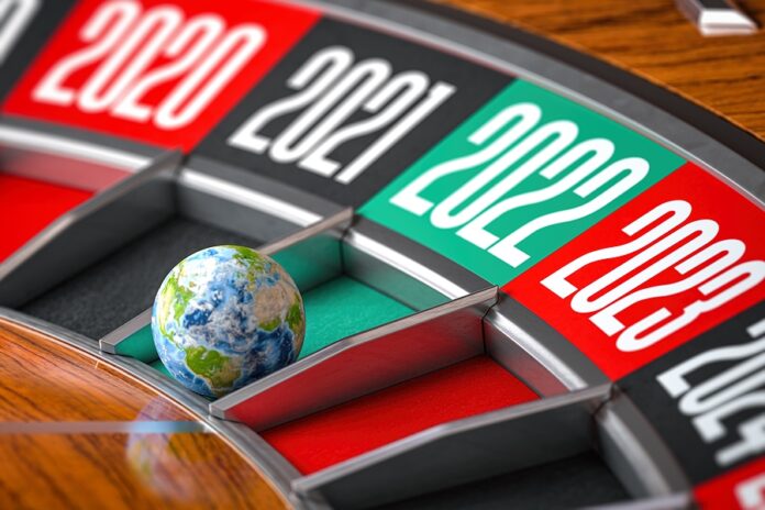 New 2022 Year concept. Earth or globe on number 2022 on casino r