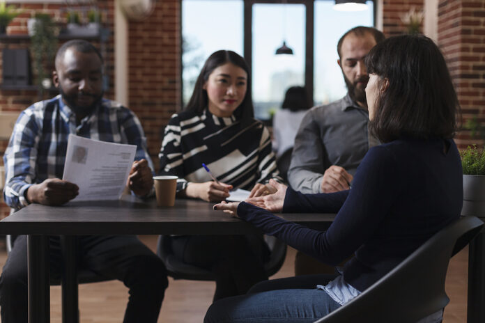 Startup Company Recruitment Board Reviewing Cv Resume Of Job Can