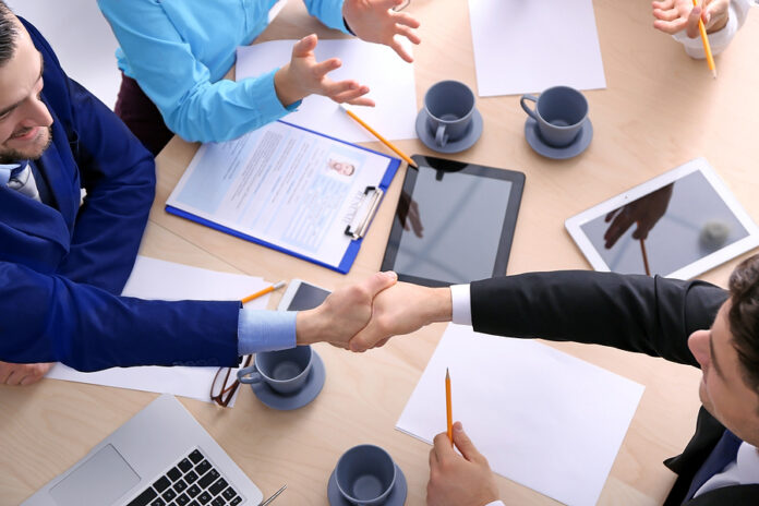 bigstock-People-shaking-hands-on-busine-175048918b