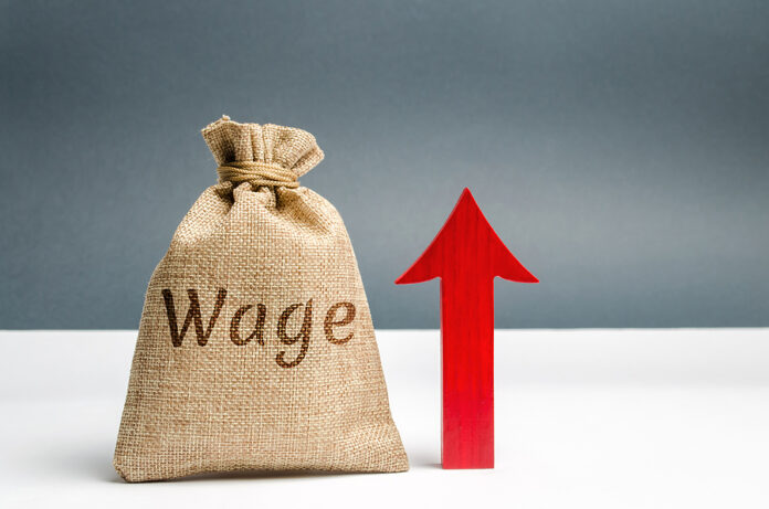 Bag With Money And Word Wage And Up Arrow. Increase Of Salary. W