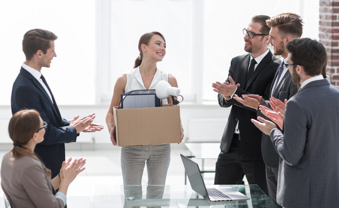 business team applauds the new employee