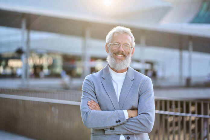 Confident Happy Mature Older Successful Gray-haired Business Man