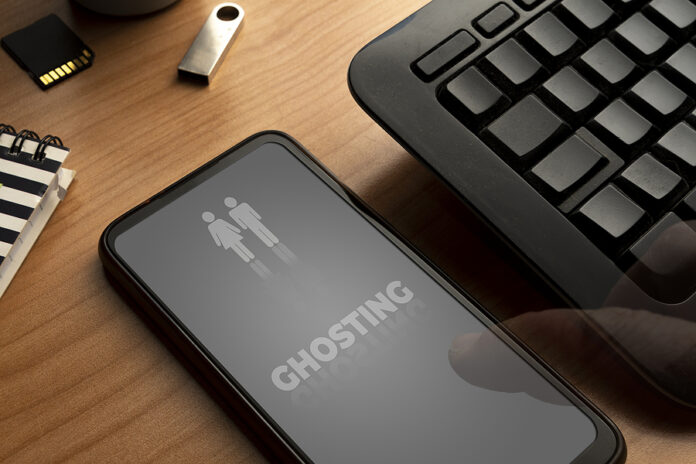 Ghosting Concept: Smartphone With The Word Ghosting On Display A