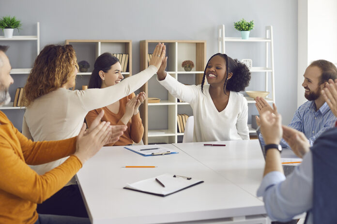 Happy Business Women Making A Deal And High Fiving Each Other Si