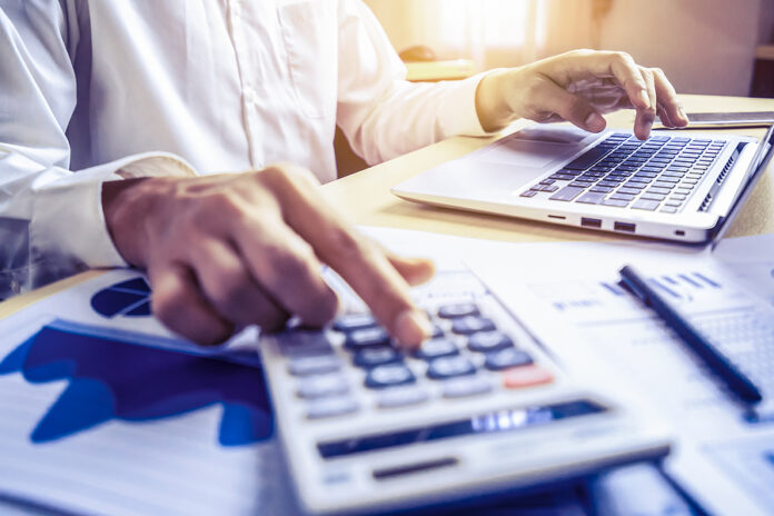 Businessman Accountant Or Financial Expert Analyze Business Repo