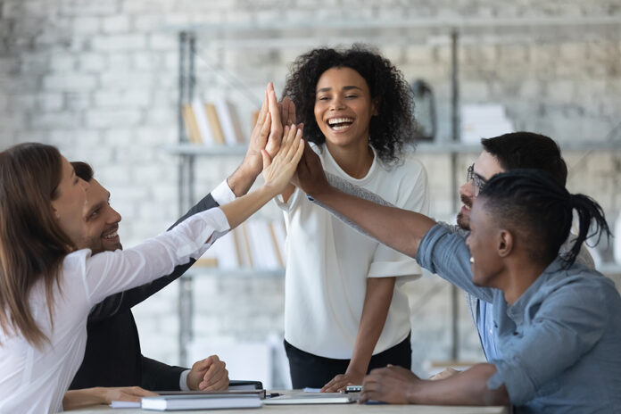 African American Businesswoman With Multiracial Business People