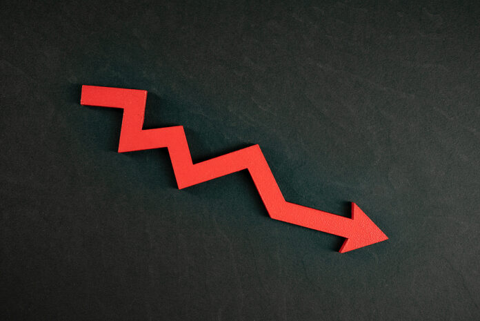 Chart With Red Down Arrow Isolated On Black Background. Falling