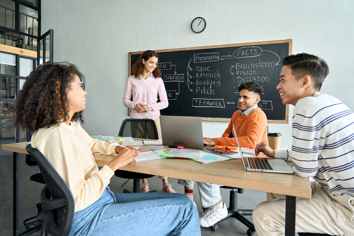 Four Multiethnic Young Professional Coworkers Business Startup G