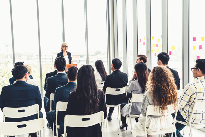Group Of Business People Meeting In A Seminar Conference . Audie
