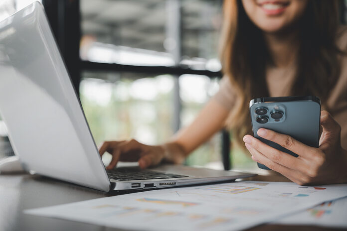 Happy Lifestyle Female Smiling Using Smartphone In Coffee Shop,
