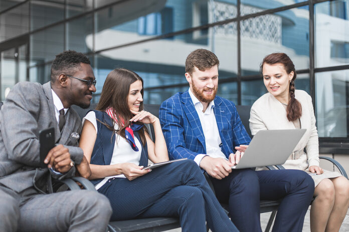 Group Of Happy Diverse Male And Female Business People Team In F