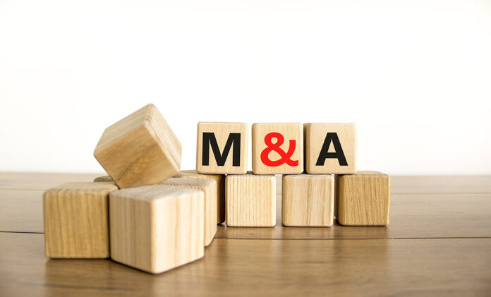 Mergers And Acquisitions Symbol. Concept Words M And A - Mergers