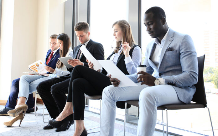 Stressful people waiting for job interview in office