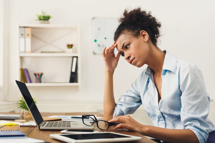 Deadline Stress Concept - Sad African-american Business Woman Si