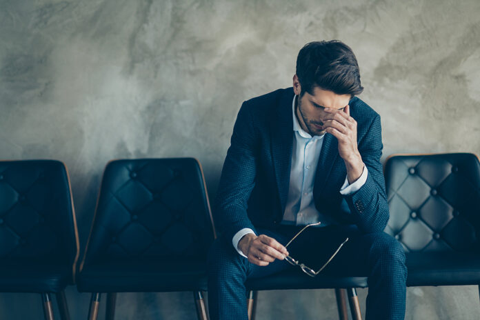 It Is Fail. Portrait Of Sad Upset Frustrated Businessman Sit On
