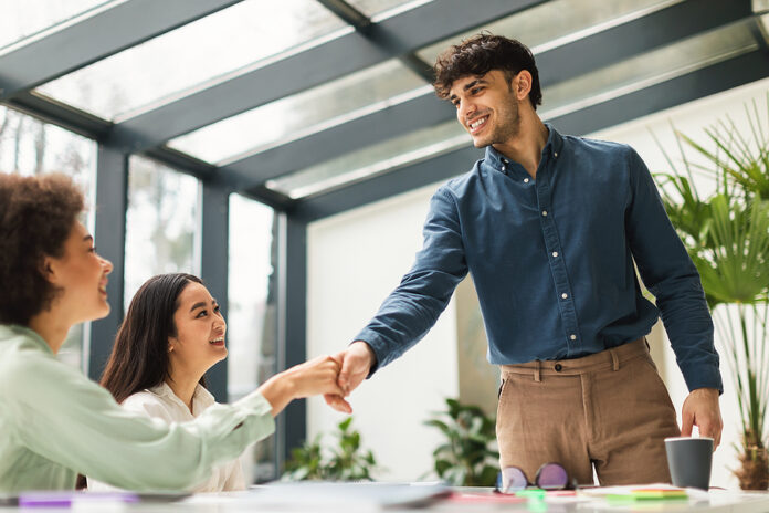 Multiracial Business People Shaking Hands During Job Interview I