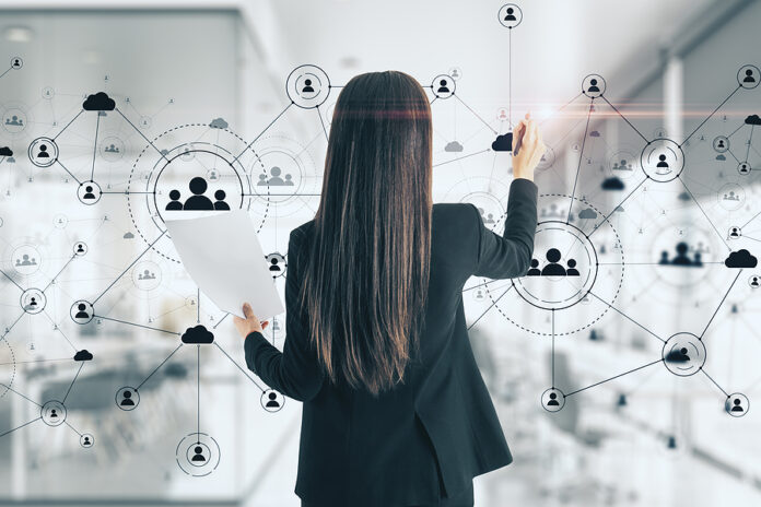 Young Businesswoman Drawing Social Network Interface On Virtual